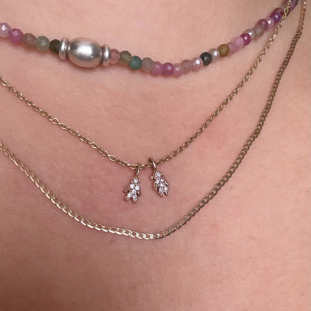 Dije niño/niña con diamante