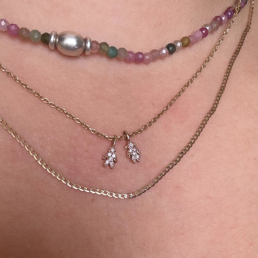 Dije niño/niña con diamante
